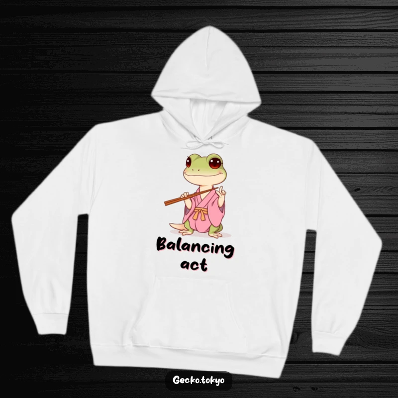 Funny gecko hoodie, hilariously attempting to balance chopsticks in a pink kimono, radiating cozy humor and playful struggle, a warm funny gift.