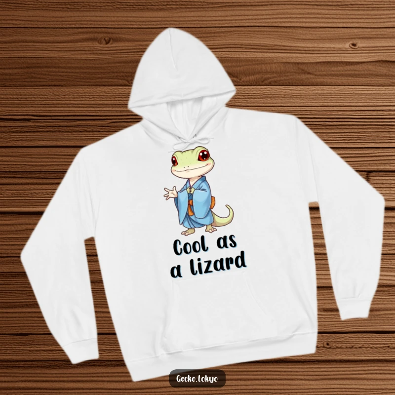 Funny gecko hoodie, depicted bowing respectfully in a blue kimono, radiating calm and gentle humor, a comfortable funny gift.