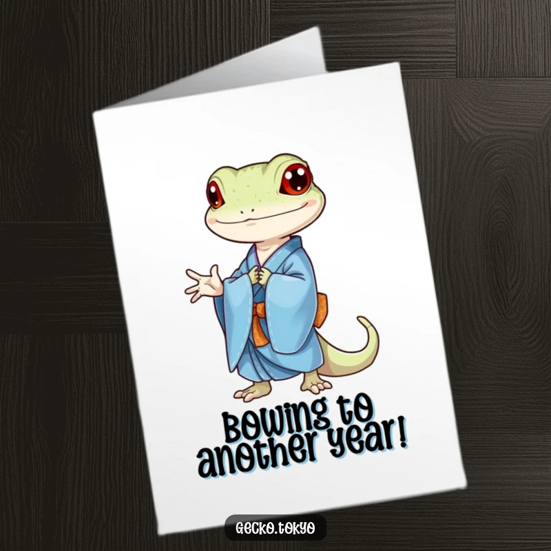 Funny Free Printable Birthday Card with a gecko in a blue kimono bowing elegantly, showcasing respect and good wishes.